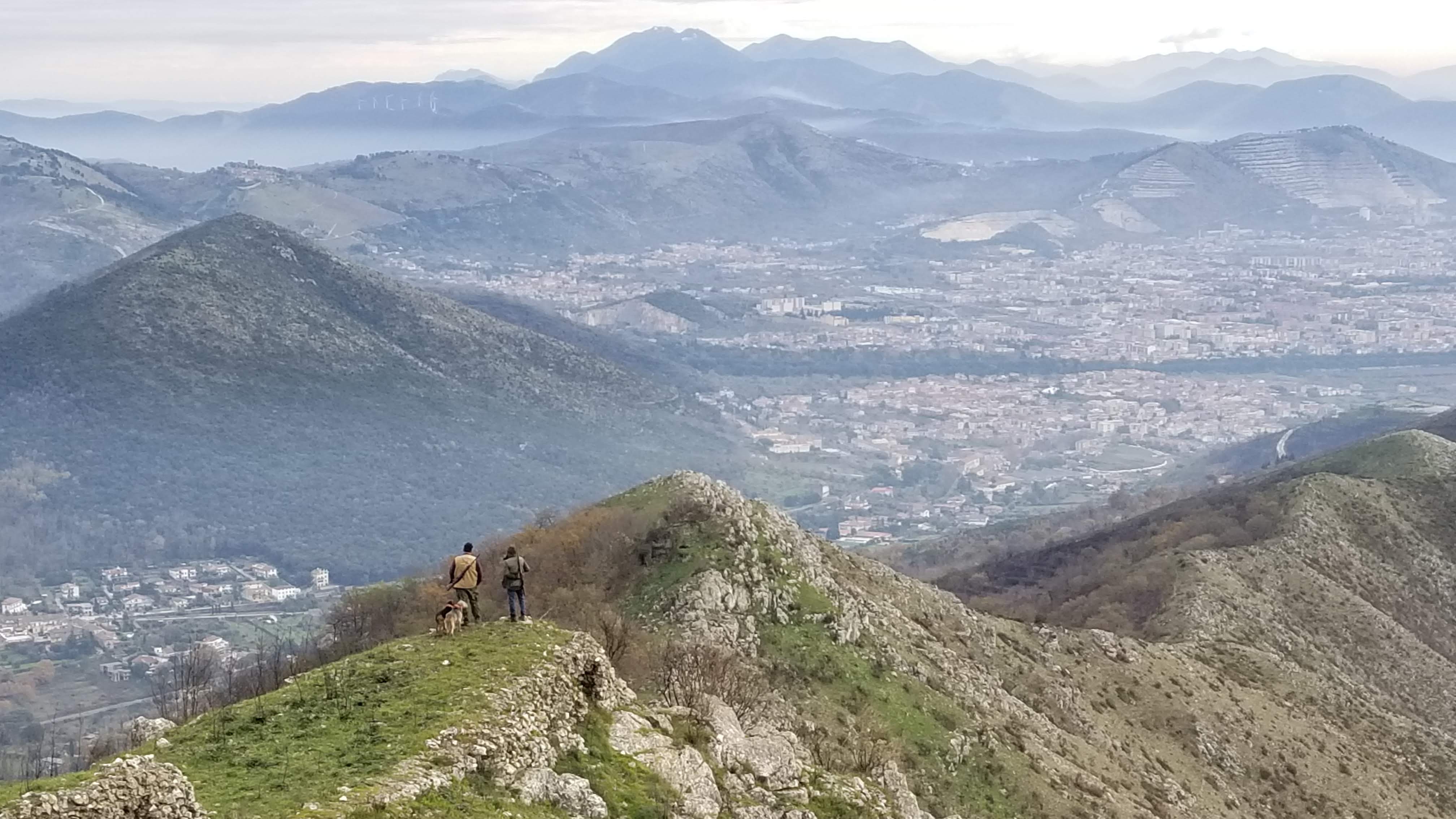 Background of two hunters gazing around the reagion of San Prisco Italy